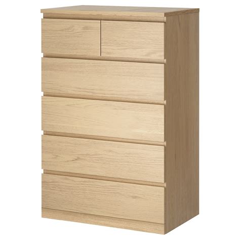 Smooth-running drawers and comes in several colours – here in a warm grey-stained finish. . Malm 6drawer dresser